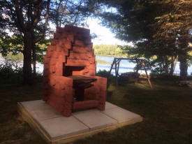 cottage acadia outside precast fireplace